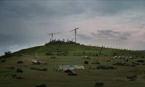 A building site on a grassy hill